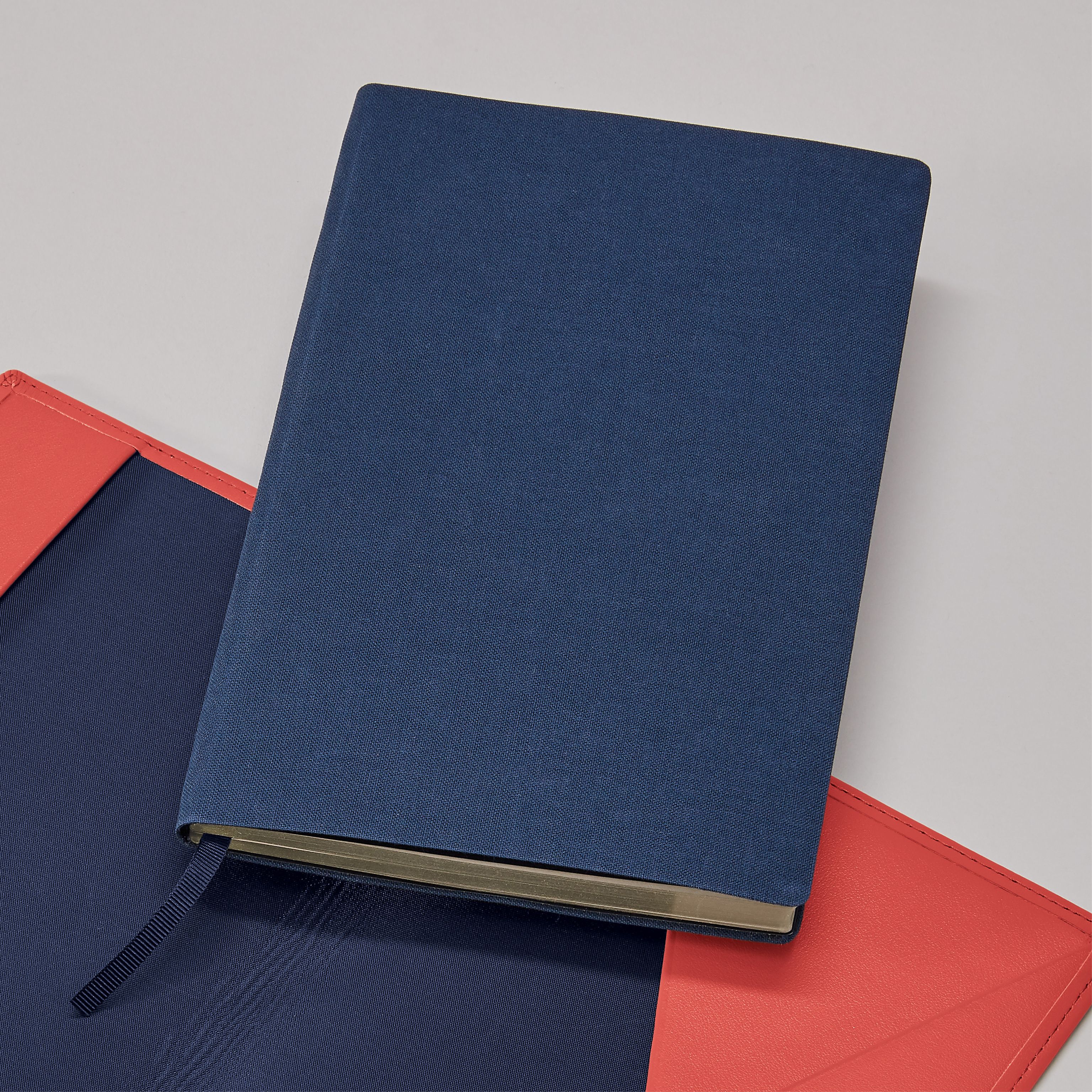 Refill permanently bound journals by rebinding.